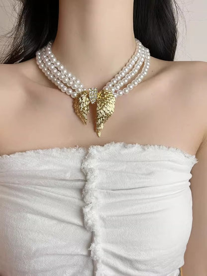 Divine Wings Pearl Choker Necklace – Angel Wing Statement Imitation Jewelry for Women