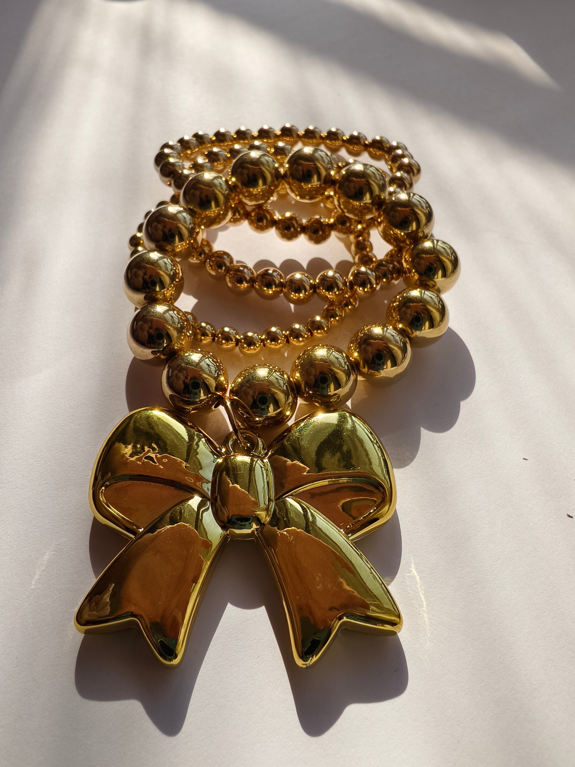 Golden Grace Charm Bracelets_Bow Royale.