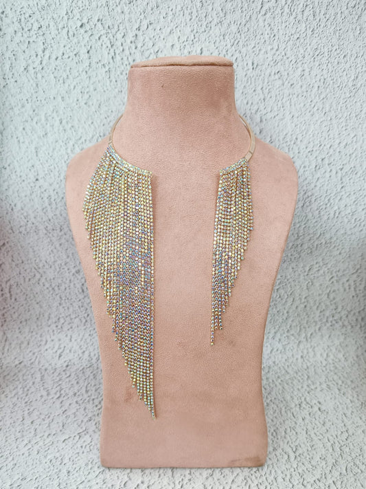 Beaded necklace on a mannequin bust against a textured gray background